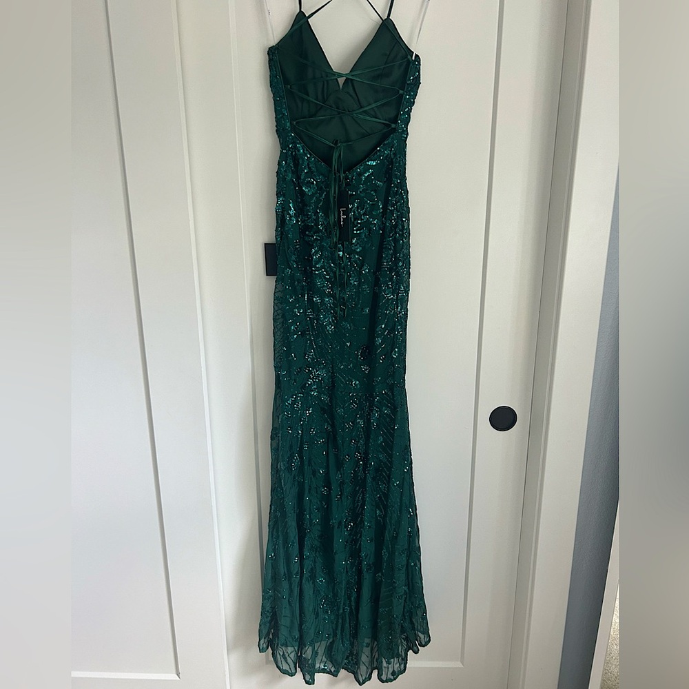 Dark green Lulu’s backless prom dress with lace up straps and sequin detailing